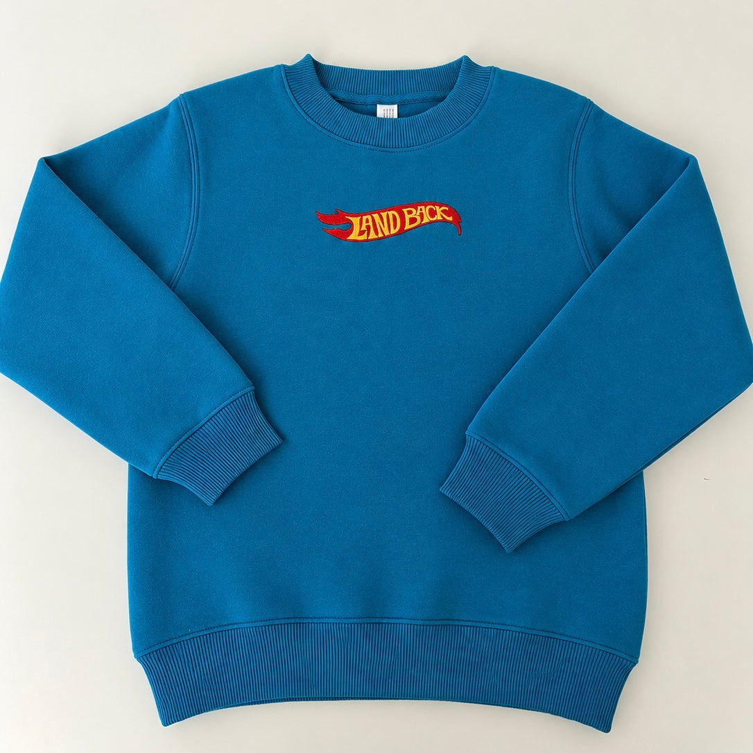 * Land Back sweater